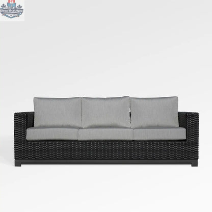 Enclover Trillium sofa with Sunbrella cushions, showcasing a stylish and comfortable living room furniture piece.