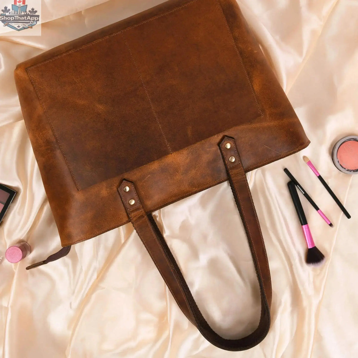 NAB Leather classic cognac leather tote bag with sturdy handles, stylish wayfarer design, perfect for everyday use.