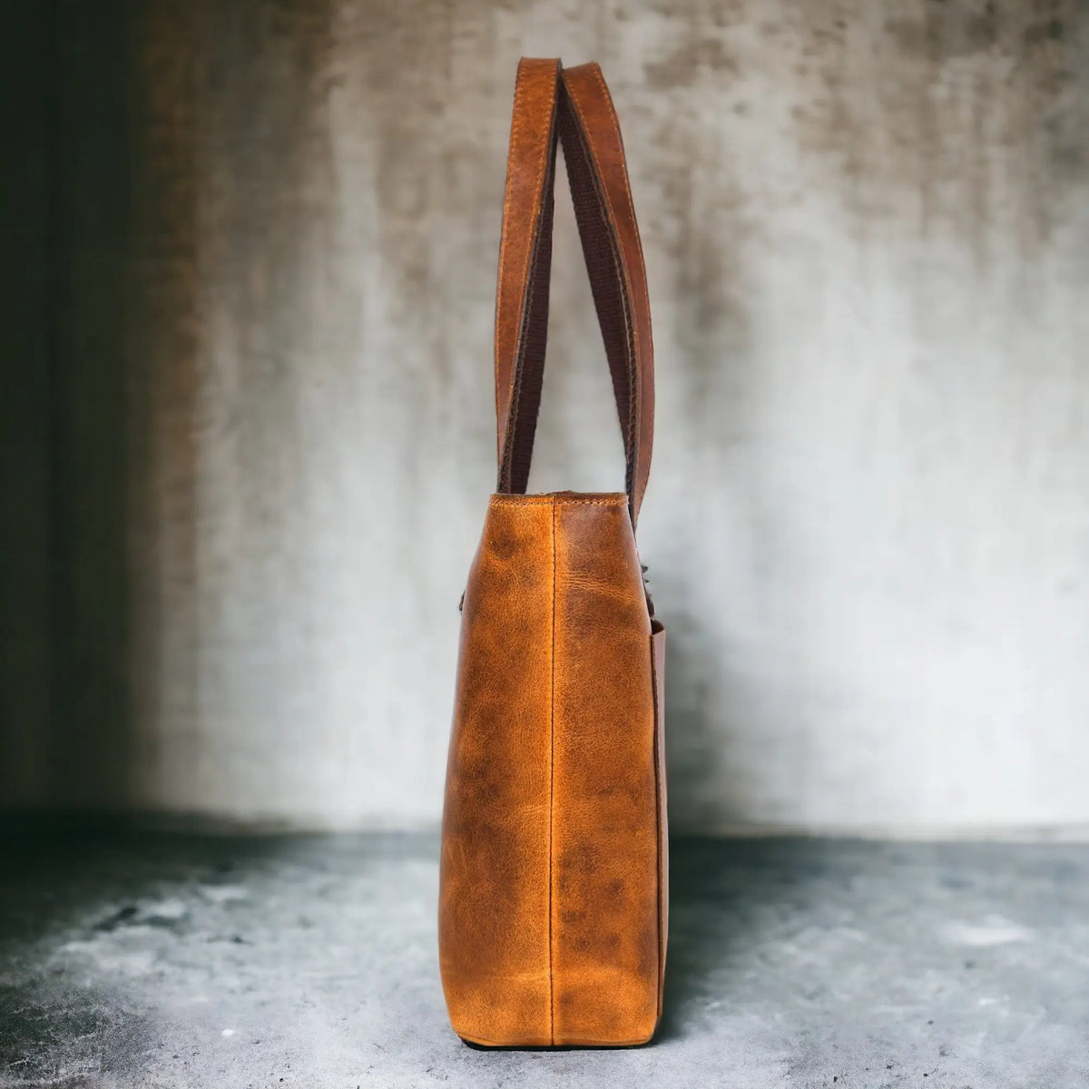 NAB Leather classic cognac leather tote bag with stylish design, perfect for everyday use and versatile leather duffle style.
