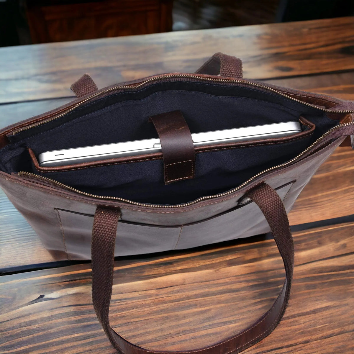 Classic brown leather tote bag by NAB Leather, showcasing its spacious design, sturdy handles, and timeless style for everyday use.
