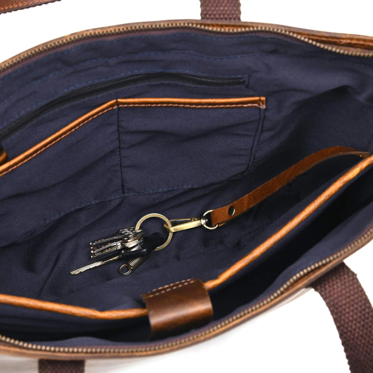 NAB Leather classic cognac leather tote bag with sturdy handles, stylish wayfarer design, ideal for everyday use.