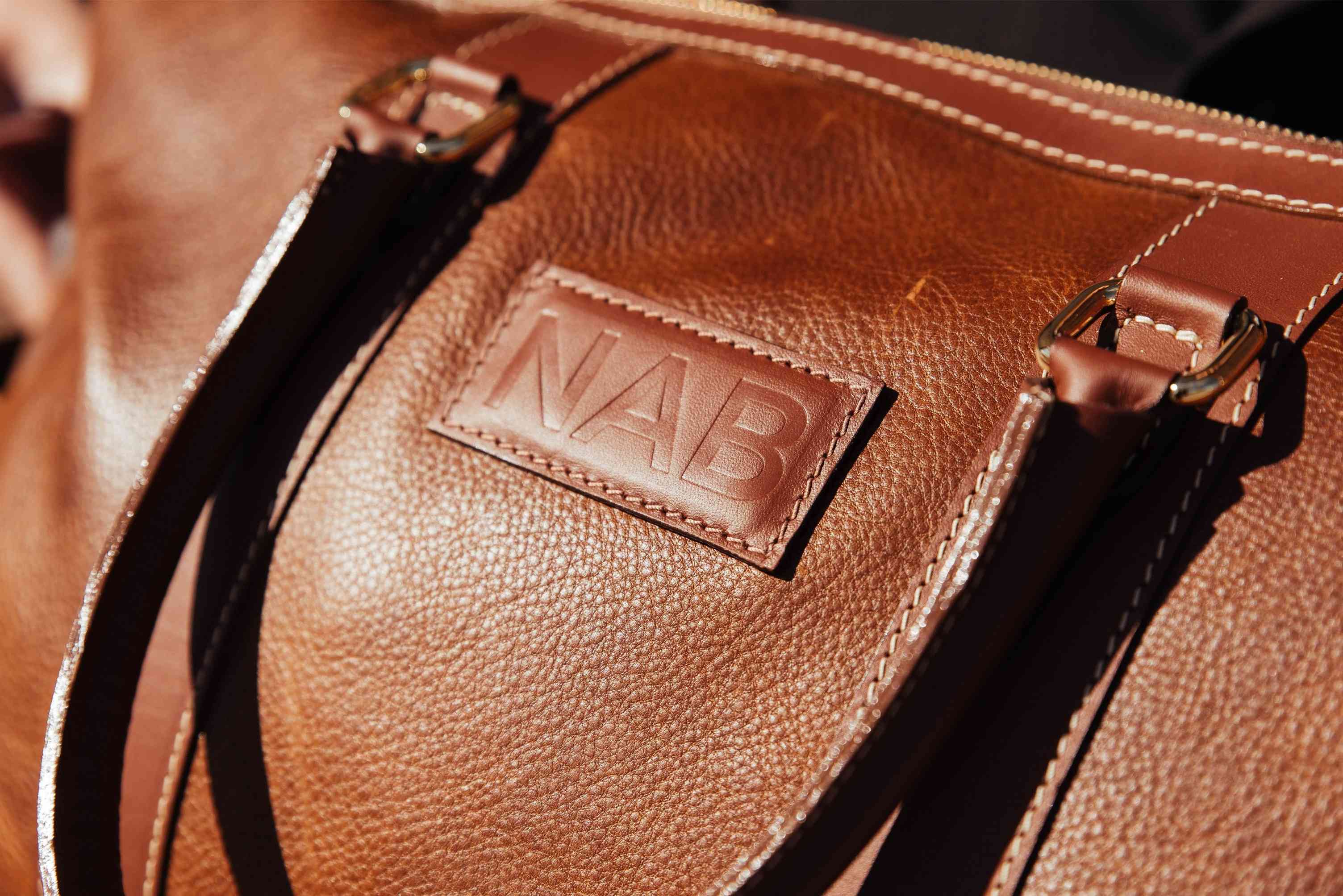 The Shield Duffle- Cognac Full-Grain Leather Duffle Bag Made in Canada - Www.Shopthatapp.ca