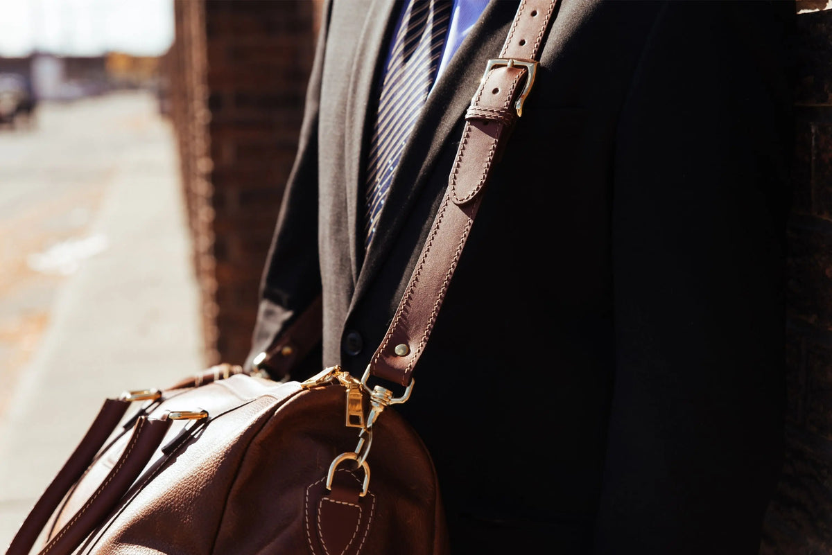NAB Leather Cognac leather duffle bag with sturdy handles and sleek design, crafted in Canada.