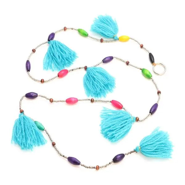 Colorful tassel garland for festive home decor by Suzie Blue Canada, perfect for celebrations and party decorations.