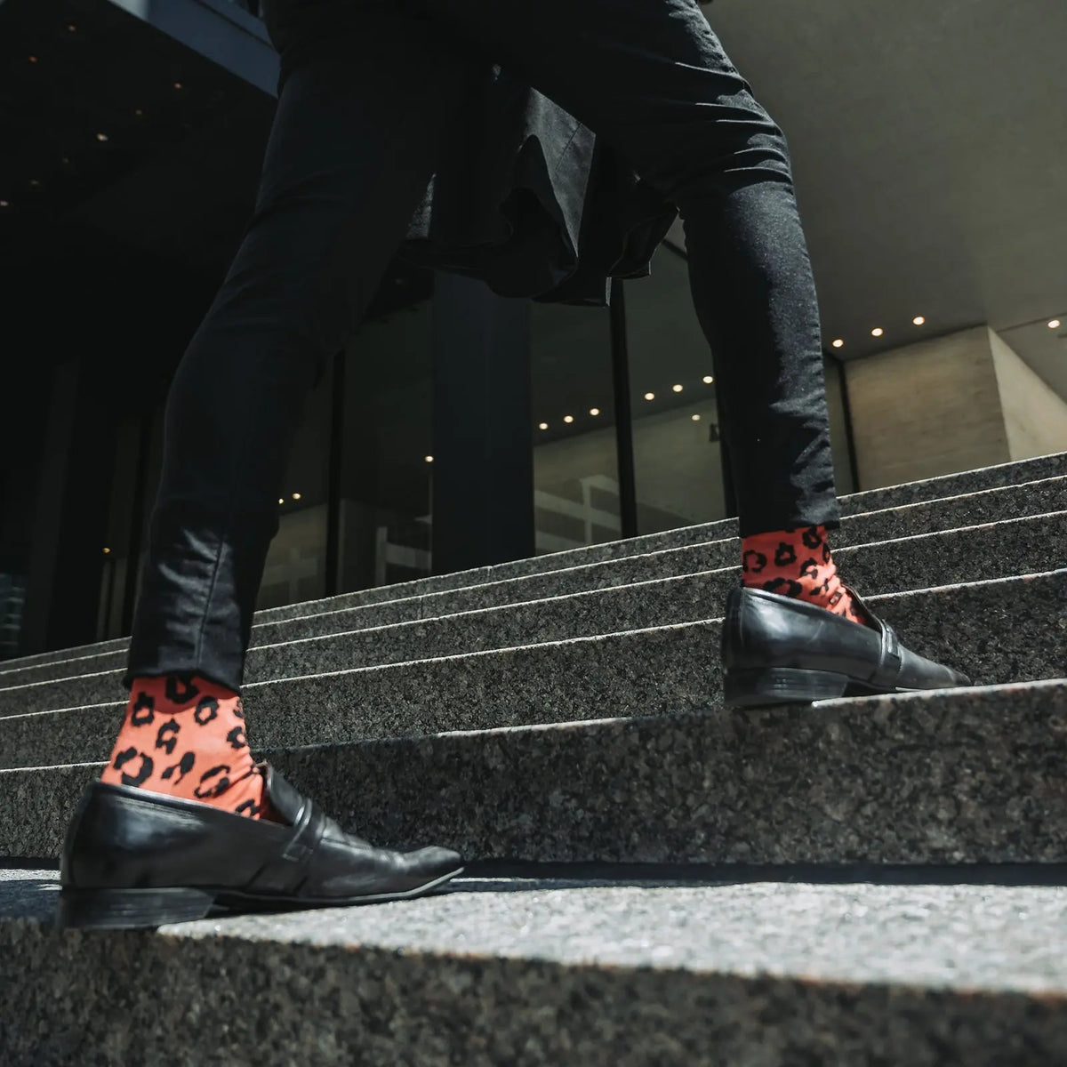 Leopard print socks by Velvet and White, featuring a chic design suitable for stylish night out attire.