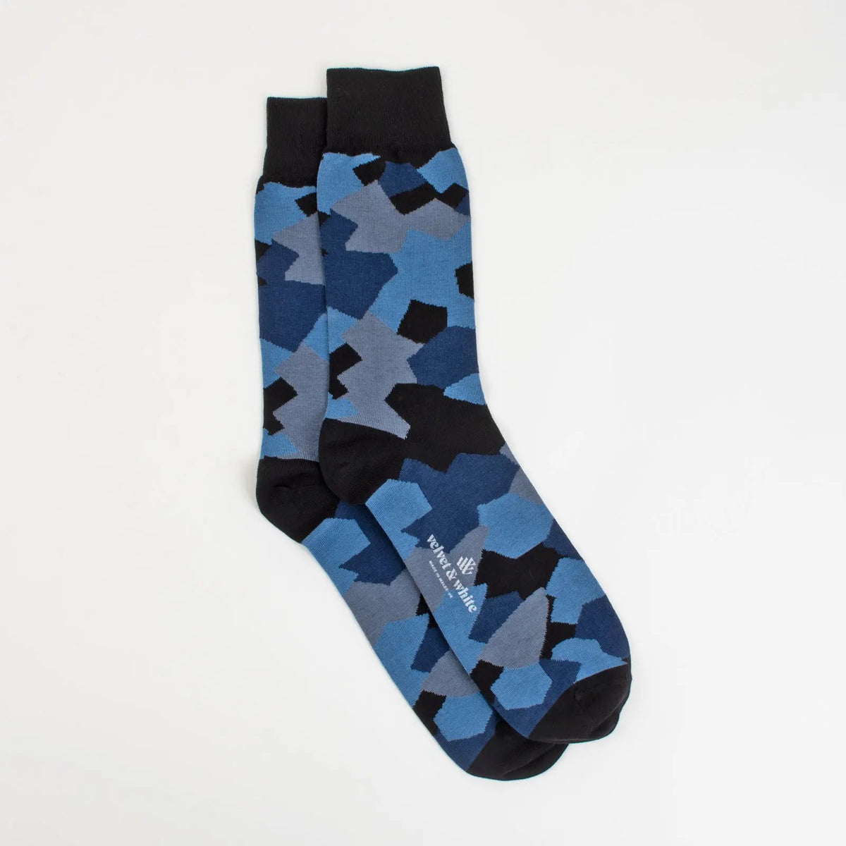 Blue camouflage print socks by Velvet and White featuring a stylish and versatile camouflage design.