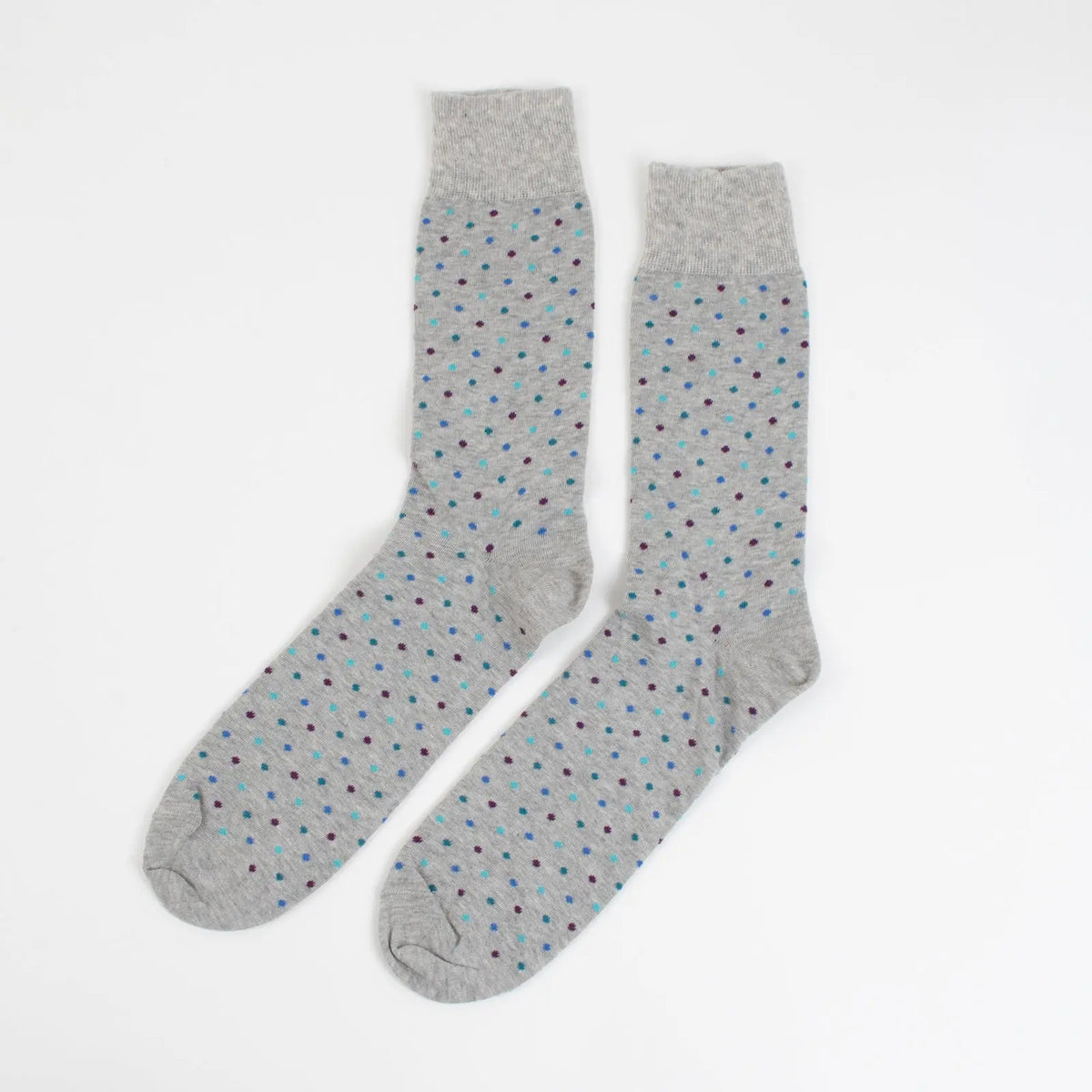 Grey Matter Dots socks by Velvet and White featuring a dotted pattern, shown in a close-up of the sock's design and texture.