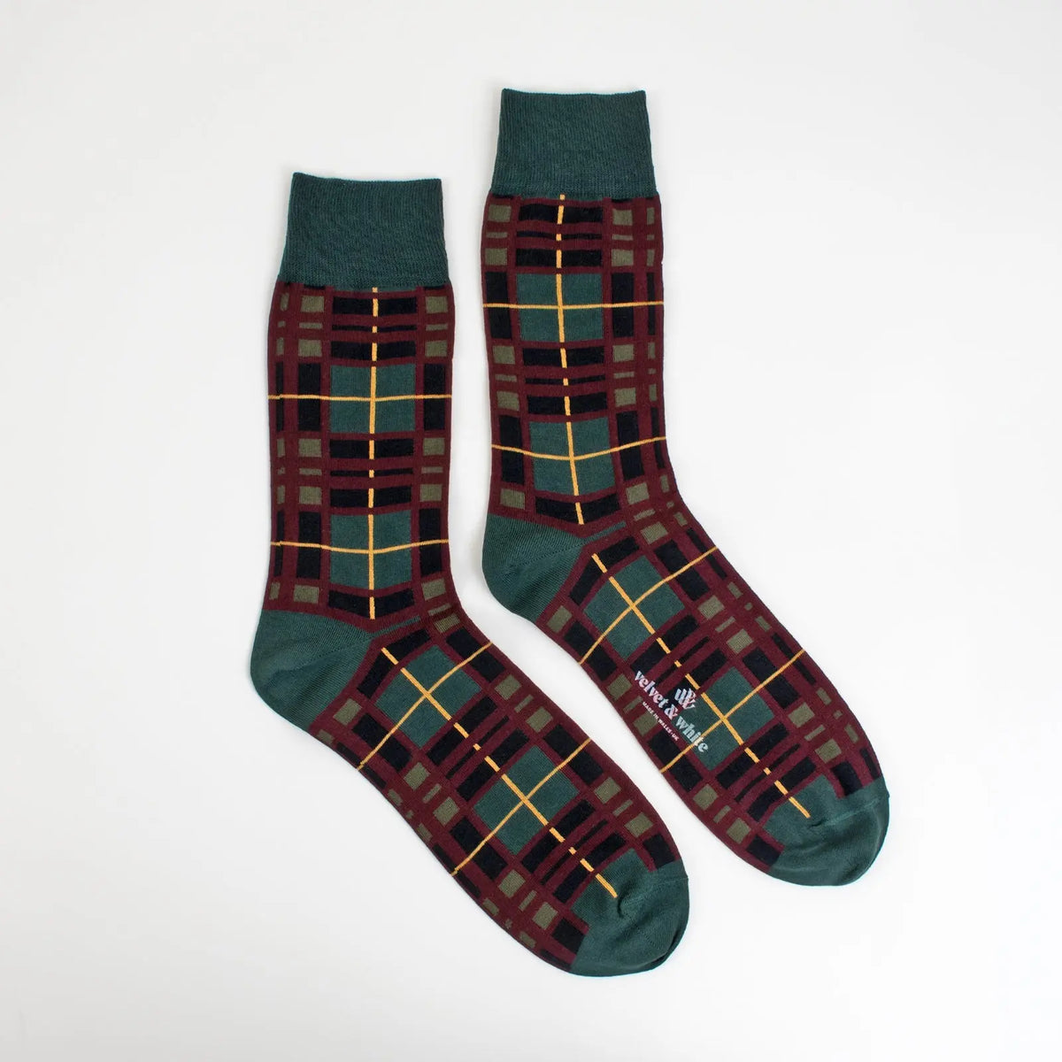 Scottish green checkered fabric socks by Velvet and White featuring stylish plaid design and comfortable fit.
