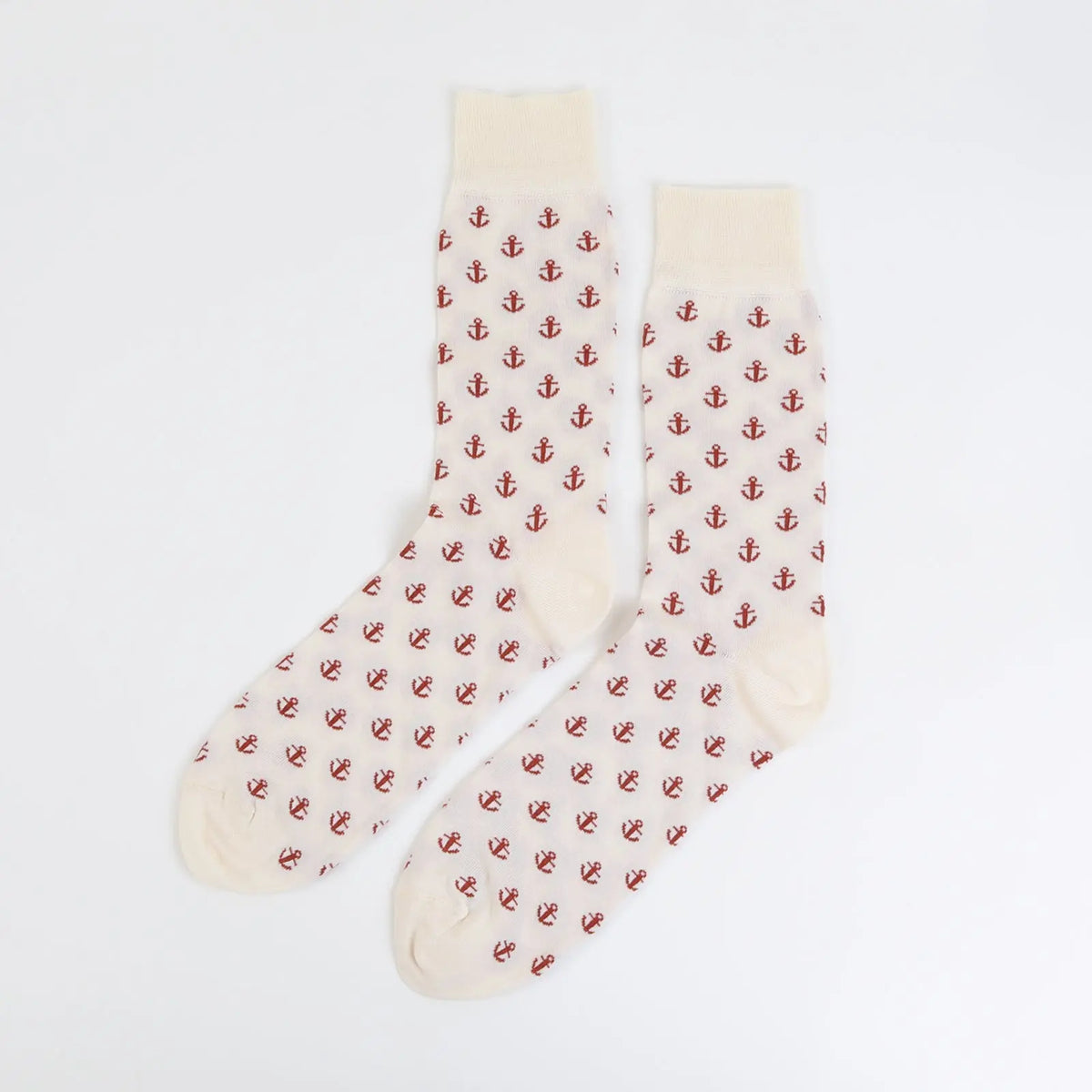 Off-white socks from Velvet and White's Anchors Away collection, featuring a stylish nautical anchor design.