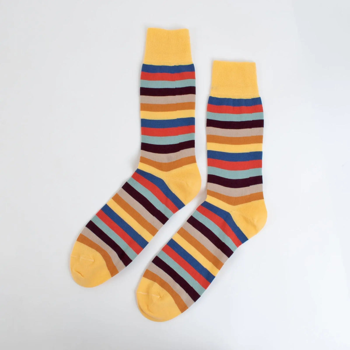 Close-up of Velvet and White Candy Stripes socks with bold red and white striped pattern on soft fabric, perfect for casual wear.
