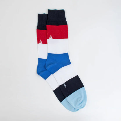 Pair of stylish socks made from nautical stripes fabric by Velvet and White, ideal for home decor and DIY projects.