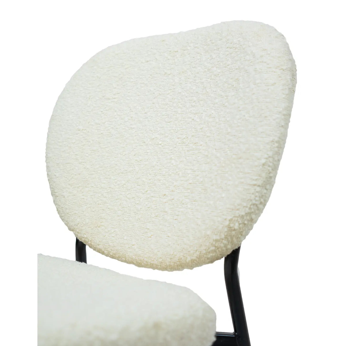 Hygge Design House Sashi dining chair with linen boucle upholstery and wooden legs, modern and stylish for dining rooms.