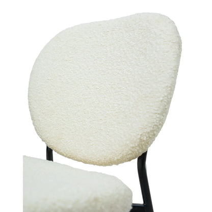 Hygge Design House Sashi dining chair with linen boucle upholstery and wooden legs, modern and stylish for dining rooms.