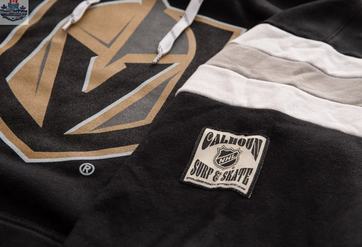 Vegas Golden Knights hoodie in retro varsity style, displayed on a hanger with team logo and classic NHL design.