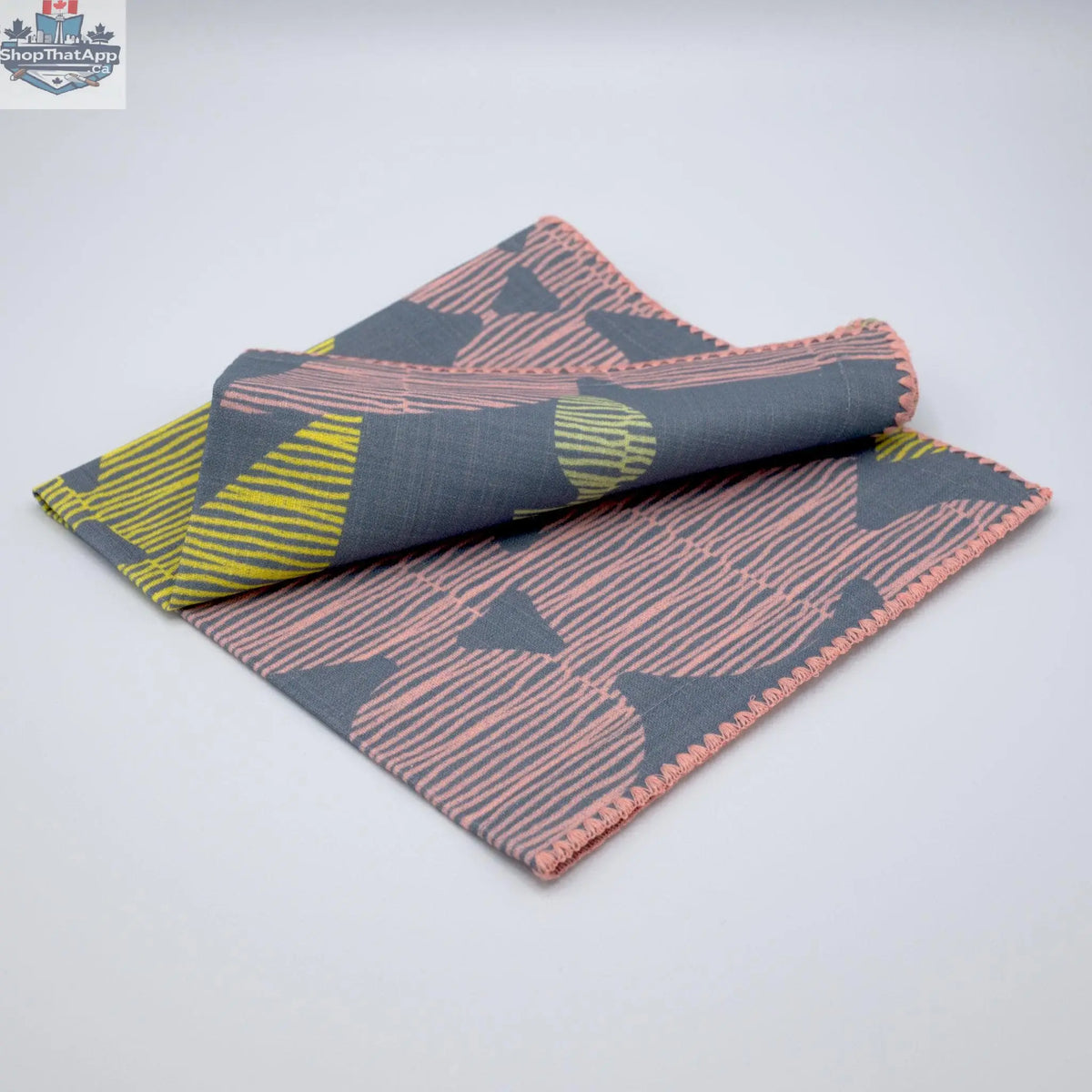 Set of four printed cotton dinner napkins featuring winter and blush designs by Hem And Tassel for celebration occasions.