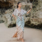 Tie dye maxi dress in lapis ombre with mint and brown hues by Suzie Blue Canada, featuring flowing fabric and vibrant pattern.