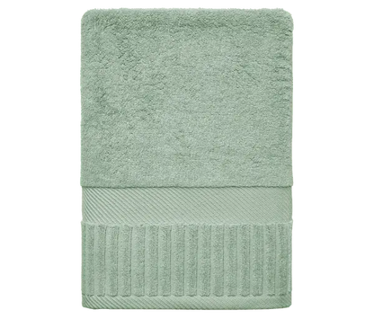 Sage Zenith Turkish bath sheet towel by Skylark+Owl Canada, showing soft, large, absorbent fabric with a textured edge.