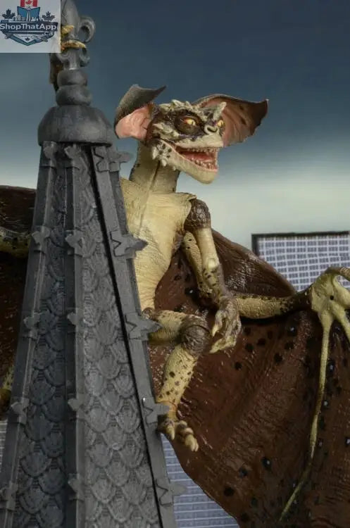 Toy Snowman Gremlins 2 Bat Gremlin collectible action figure in dynamic pose with detailed features, perfect for display.