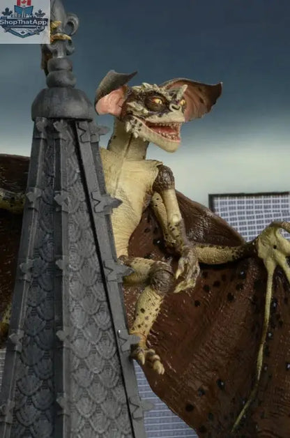 Toy Snowman Gremlins 2 Bat Gremlin collectible action figure in dynamic pose with detailed features, perfect for display.
