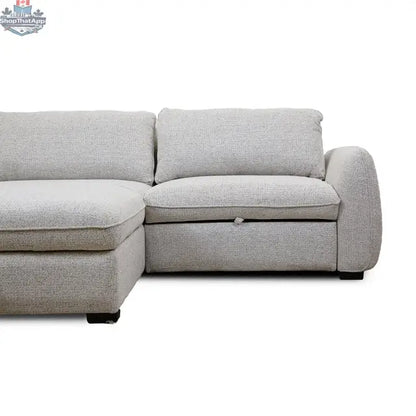 Amira pullout sleeper sectional with storage chaise in neutral fabric, featuring modular design and plush cushions by Hygge Design House.