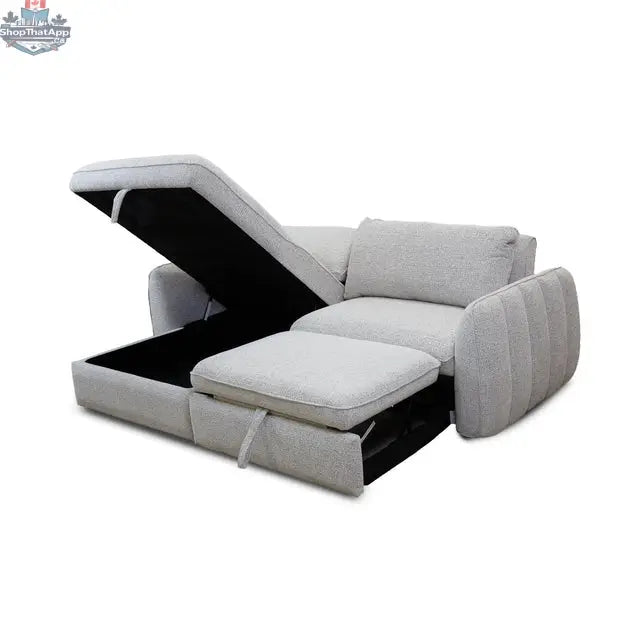Amira pullout sleeper sectional with storage chaise in a modern living room, showcasing its open sleeping and storage features.