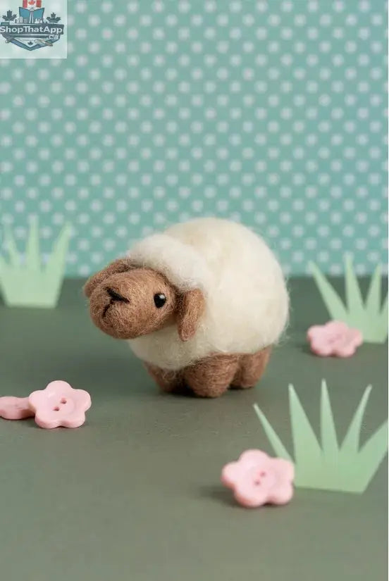 Hawthorn Needle Felting Kit by Art Noise featuring a handmade sheep mini figure crafted with colorful wool and felting tools.