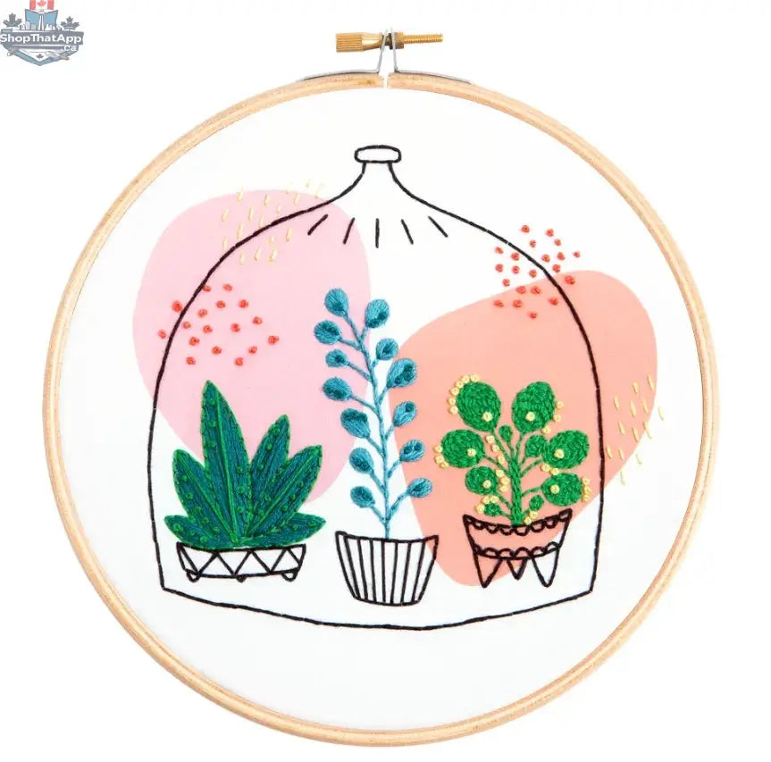 Hawthorn Handmade Glass Garden embroidery kit by Art Noise showing colorful fabric and embroidery floss for needlecraft.
