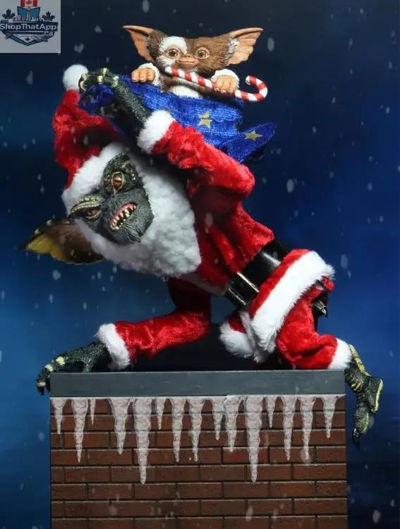 Toy Snowman Gremlins action figure two-pack featuring Santa Stripe and Gizmo collectible toys, detailed figures in festive poses.