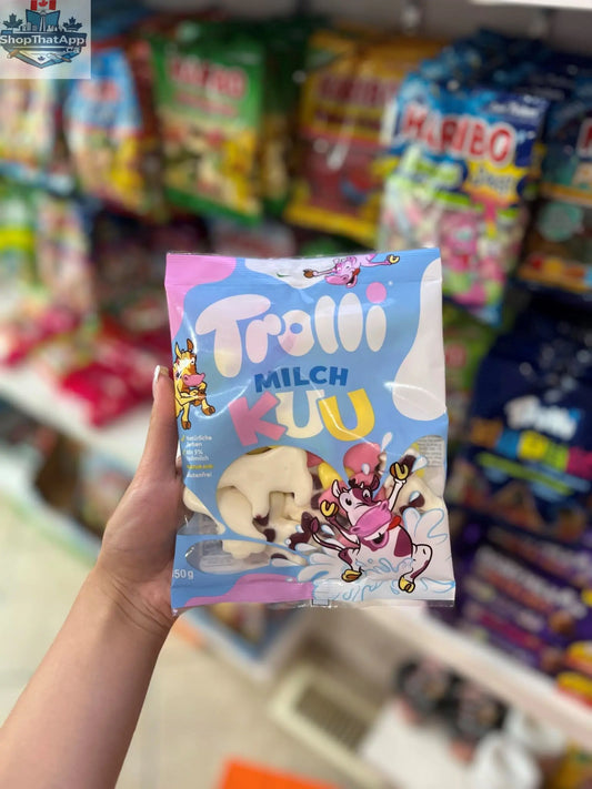 German Trolli Milch Kuu gummy candy in a 150g bag, featuring creamy milk flavor and colorful bear-shaped gummies.