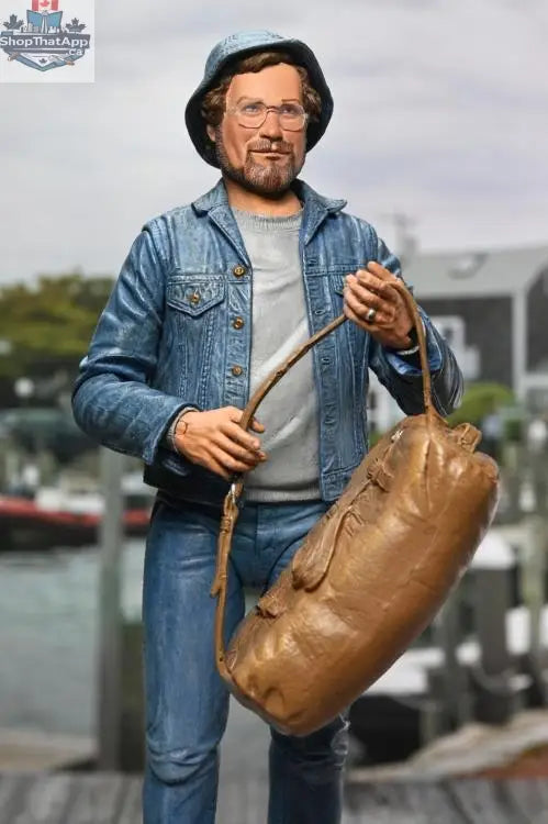 Toy Snowman Jaws 50th Anniversary Action Figure of Matt Hooper with Amity arrival scene, detailed collectible toy on display.