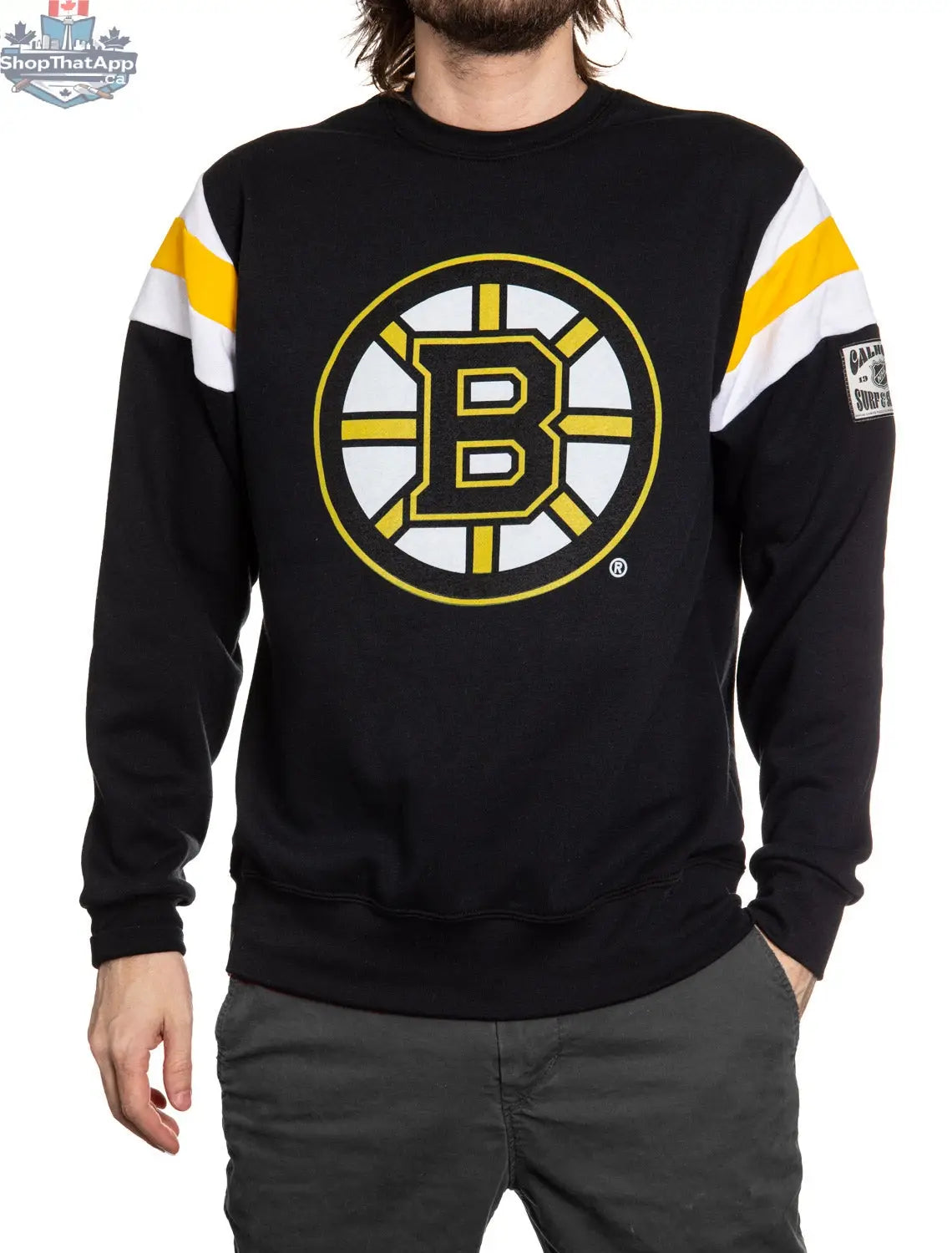Calhoun Surf N' Skate Boston Bruins crewneck sweatshirt with varsity retro style design, featuring team logo and classic varsity lettering.
