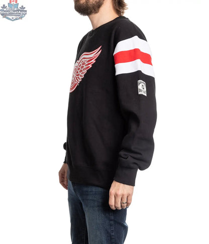 Detroit Red Wings crewneck sweater in retro varsity style, displayed from the side, by Calhoun Surf N' Skate.