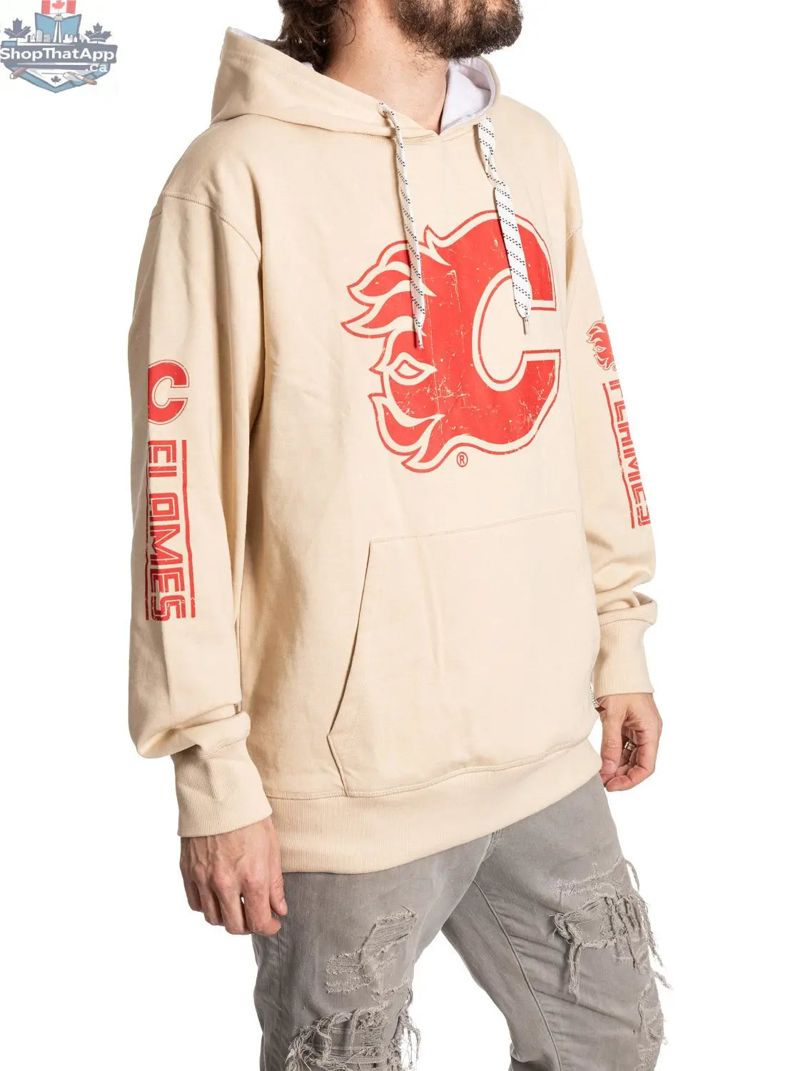 Calgary Flames vintage vibes hoodie by Calhoun Surf N' Skate, oatmeal color, side view showing front and sleeve details.