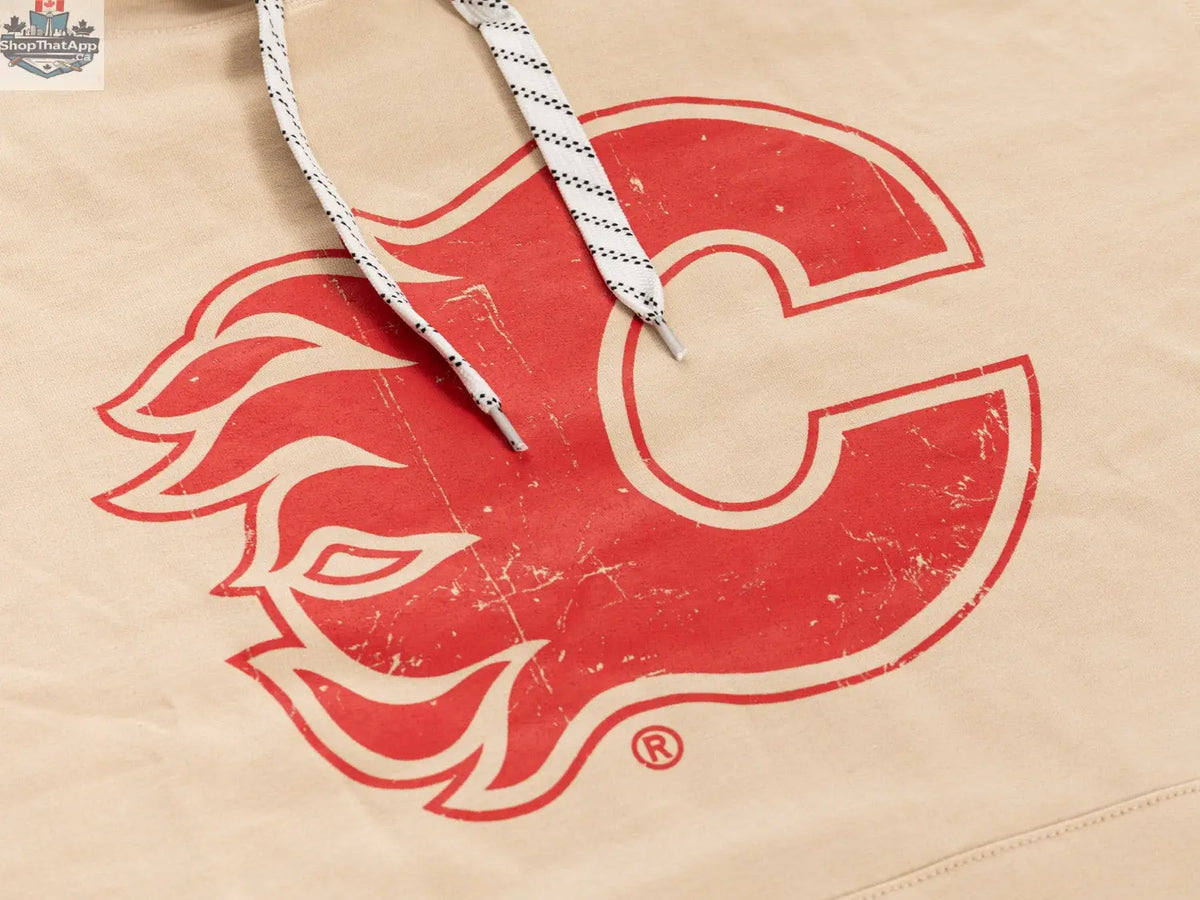 Calgary Flames vintage hoodie by Calhoun Surf N' Skate featuring flame logo and oatmeal color, ideal for true hockey fan apparel.