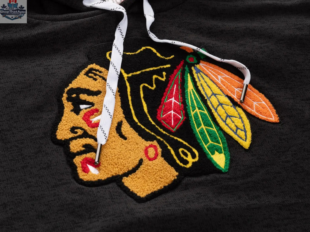 Black Chicago Blackhawks hoodie from Calhoun Surf N' Skate's Muskoka Collection, shown with detailed front view.