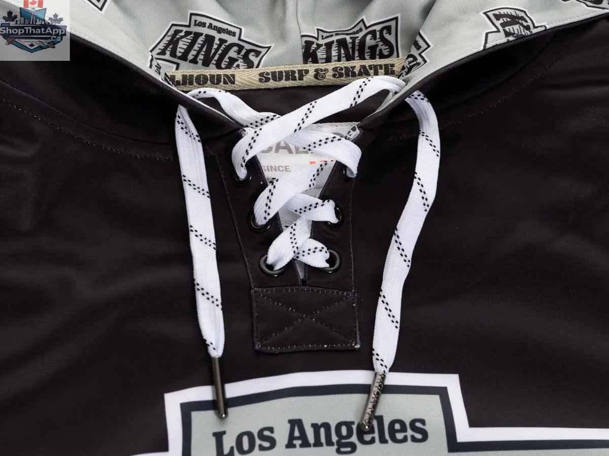 Calhoun Surf N' Skate Los Angeles Kings hockey lace hoodie with sublimated Kings logo detail, perfect for fans and casual wear.