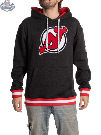 Black New Jersey Devils hoodie with Muskoka design by Calhoun Surf N' Skate, featuring team logo and cozy fabric.