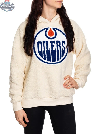 NHL Edmonton Oilers ladies' Sherpa hoodie by Calhoun Surf N' Skate featuring team logo and cozy fleece lining.