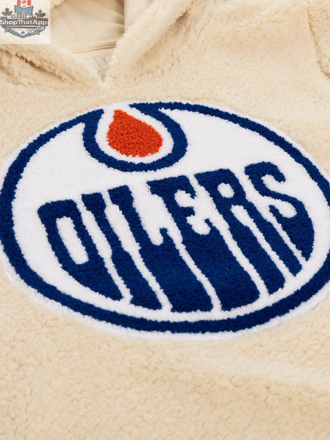 NHL Edmonton Oilers ladies' sherpa hoodie by Calhoun Surf N' Skate featuring team logo and soft warm fleece material.