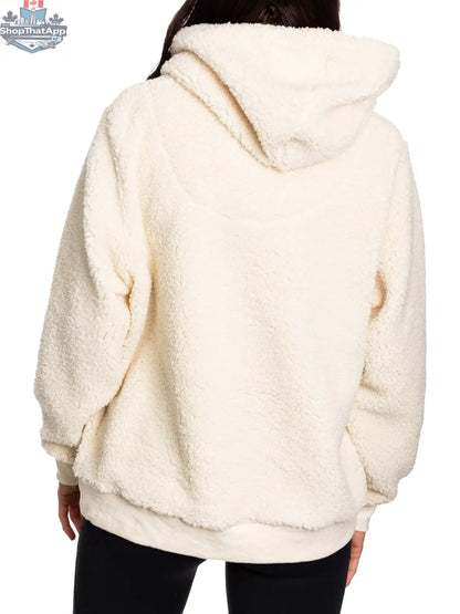 NHL Edmonton Oilers ladies' sherpa hoodie by Calhoun Surf N' Skate, showing the soft fleece-lined back with Oilers logo and team colors.