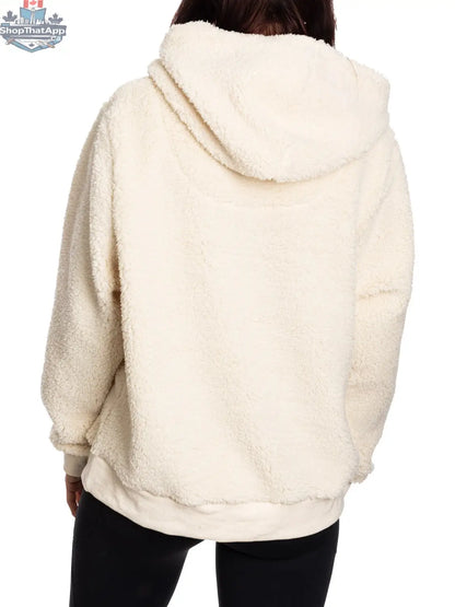 NHL Toronto Maple Leafs ladies sherpa hoodie by Calhoun Surf N' Skate, showing the cozy back design with team logo and plush fabric.