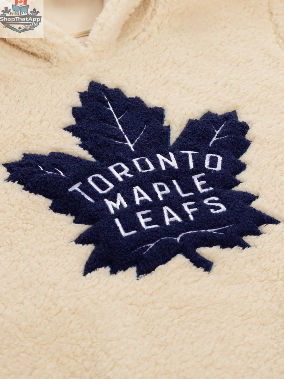 NHL Toronto Maple Leafs ladies sherpa hoodie with team logo and cozy fleece interior, perfect for showing team spirit.