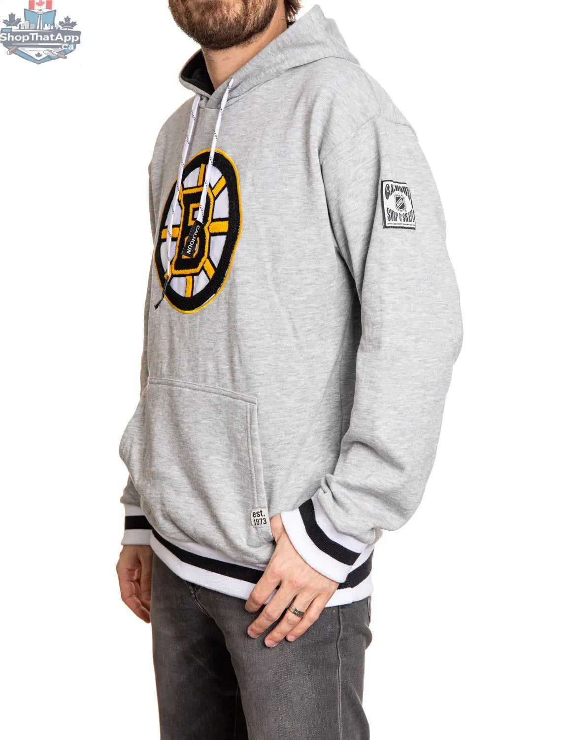 Boston Bruins chenille woven logo hoodie by Calhoun Surf N' Skate, shown from the side view with detailed logo and soft fabric texture.