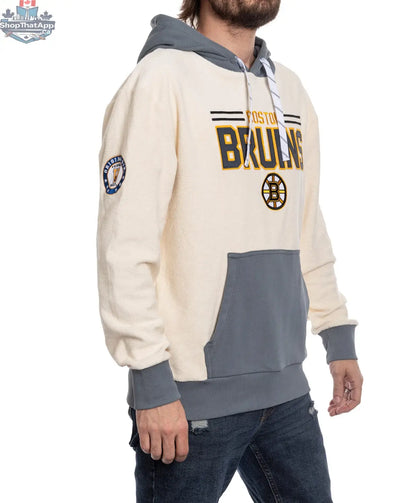 Unisex Boston Bruins retro hoodie by Calhoun Surf N' Skate, featuring a side view of the reverse terry fabric and team logo.