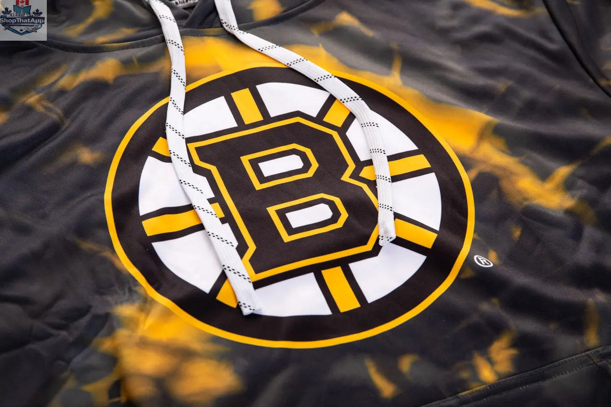 Close-up of a Boston Bruins sublimation hoodie by Calhoun Surf N' Skate, showcasing detailed team logo and vibrant design.