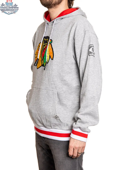Chicago Blackhawks hoodie featuring a muskoka style premium chenille woven logo, shown from the side in this Calhoun Surf N' Skate image.