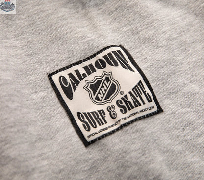 Chicago Blackhawks hoodie with Muskoka-style premium chenille woven logo, featuring a Calhoun Surf N' Skate brand jocktag.