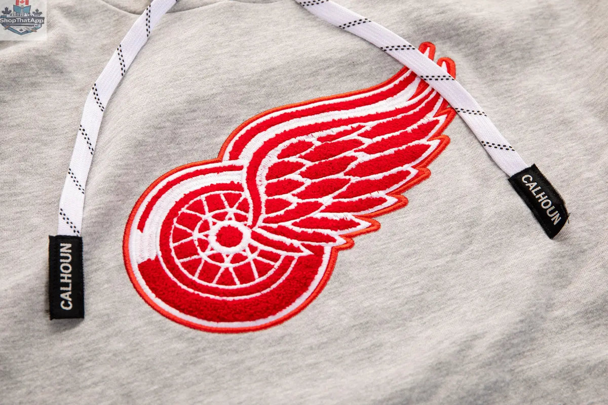 Detroit Red Wings hoodie by Calhoun Surf N' Skate featuring a Muskoka style premium chenille woven logo, official NHL merchandise.
