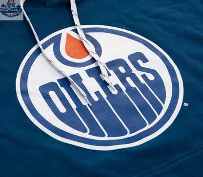 Calhoun Surf N' Skate Edmonton Oilers retro varsity hoodie with team logo, detailed fabric close-up, showcasing comfortable fan style.