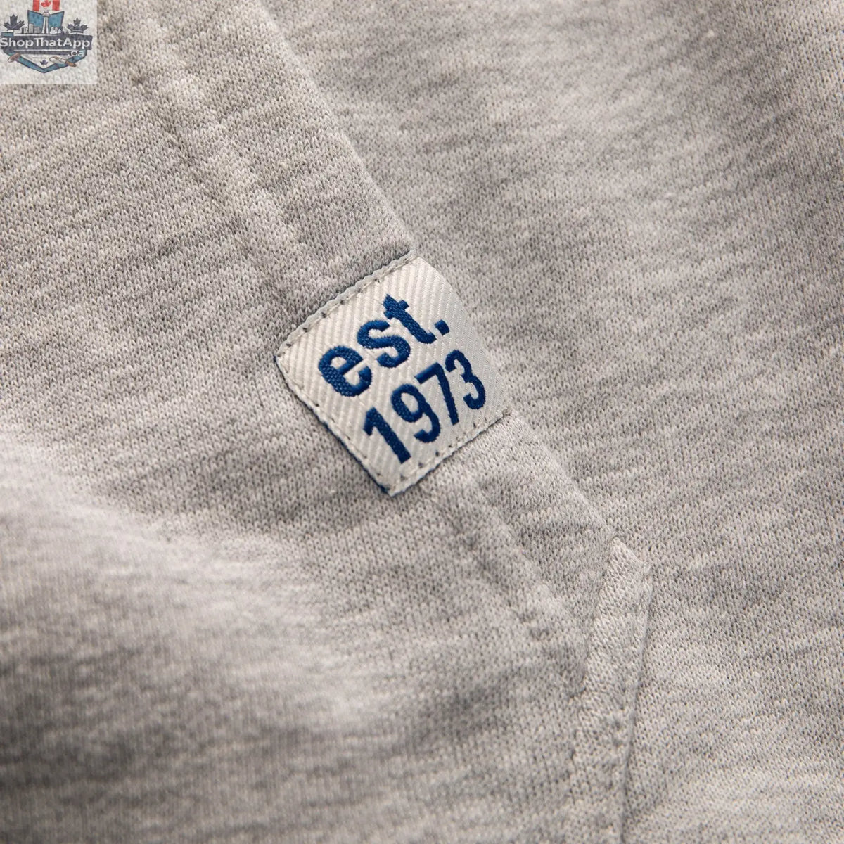 Navy Montreal Canadiens hoodie with Muskoka-style premium chenille woven logo by Calhoun Surf N' Skate, showing front view.